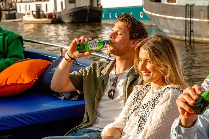 Guests enjoying drinks on a canal cruise